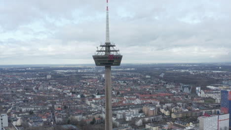 Forwards-fly-to-ring-on-Colonius-telecommunications-tower.-Former-restaurant-and-lookout-platform-high-above-city.-Cologne,-Germany