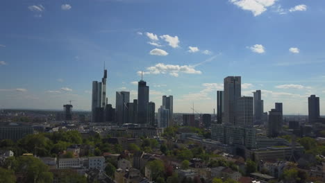 AERIAL:-View-of-Beautiful-Frankfurt-am-Main-Skyline-in-Blue-Sky-Sunshine