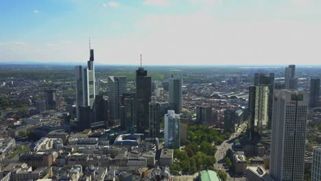 AERIAL:-Rising-up-over-Frankfurt-am-Main,-Germany-Skyline-on-Beautiful-Summer-Day