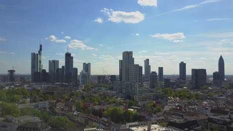 AERIAL:-Rising-up-over-Frankfurt-am-Main,-Germany-Skyline-on-Beautiful-Summer-Day
