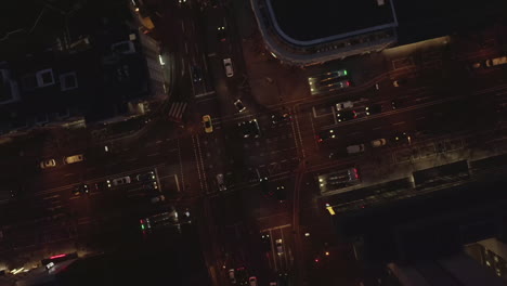 AERIAL:-Night-flight-towards-big-intersection-in-Cologne-Germany