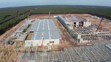 Huge-Construction-Site-and-structures-of-Factory-Building-being-built-in-Germany,-Aerial-View