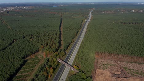 Long-German-Highway-Autobahn-in-between-Forest-Rural-Landscape,-Aerial-View-from-above