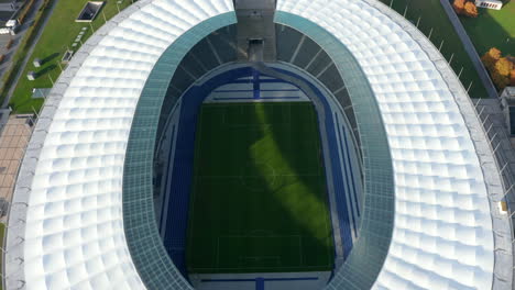 Empty-Soccer-field-Football-Stadium-Green-grass,-Aerial-Birds-Eye-Overhead-top-Down-Wide-Shot,-Berlin,-Germany-in-October-2020