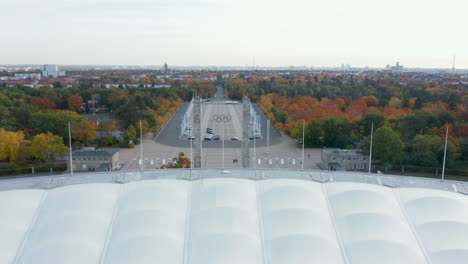 Olympic-Rings-symbols-on-Berlin-Olympia-Stadium-Entrance-from-Aerial-Drone-perspective,-October-2020
