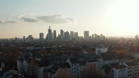 Rooftop-view-of-urban-neighbourhood.-Cityscape-with-tall-modern-skyscrapers-against-bright-sky-from-drone.-Frankfurt-am-Main,-Germany