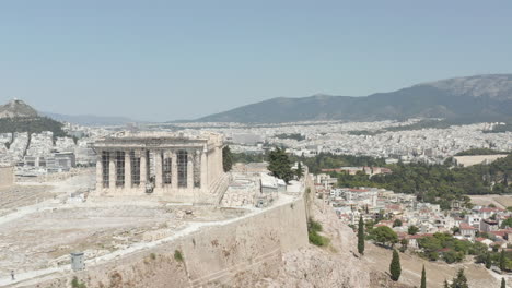 Aerial-View-of-the-Acropolis-constriction-site-on-Mountain-over-Athens,-Greece-at-Daylight