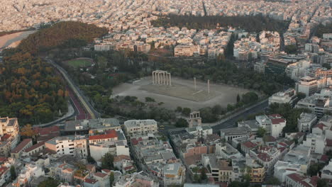Aerial-View-of-The-Temple-of-Olympian-Zeus-in-Athens,-Greece-during-Golden-Hour-Sunset-light