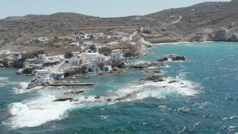 Wide-Establishing-Shot-of-Greek-Fishing-Village-build-right-by-the-Ocean