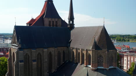 Slide-and-pan-footage-of-large-religious-building.-Flying-around-Saint-Marys-church