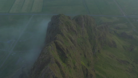 Overhead-view-of-mountains-ridge-in-southern-iceland-countryside.-Aerial-view-revealing-stunning-misty-foggy-panorama-of-icelandic-scandinavian-highlands