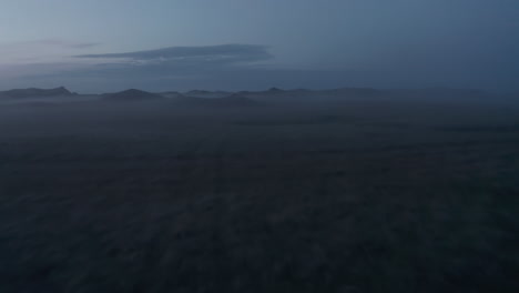 Birds-eye-of-icelandic-highlands-covered-with-mist-and-fog.-Birds-eye-of-empty-icelandic-countryside.-Moonscape-landscape.-Amazing-in-nature