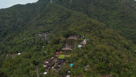 Aerial-view-of-a-mountain-temple-in-Bali.-Religious-buildings-at-Pura-Penataran-Agung-Lempuyang-temple-on-the-slopes-of-mountain-Lempuyang-in-Bali,-Indonesia