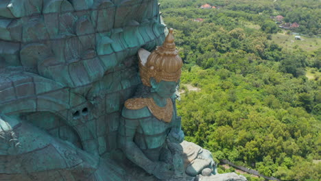 Close-up-aerial-view-of-Vishnu-riding-Garuda.-Giant-copper-blue-and-green-Garuda-Wisnu-Kencana-statue-in-Bali,-Indonesia
