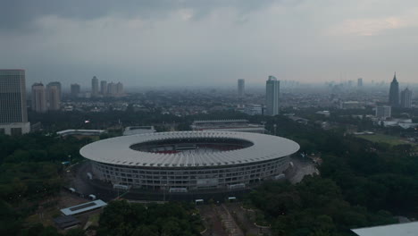 Aerial-dolly-shot-of-Gelora-Bung-Karno-athletic-stadium-facilities-in-urban-city-center-of-Jakarta