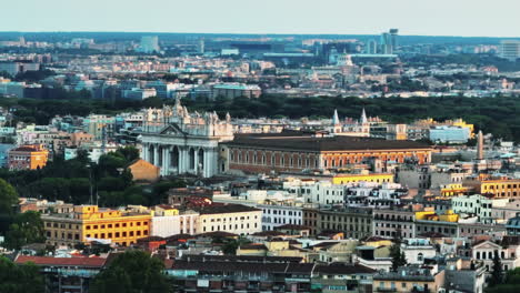 Aerial-slide-and-pan-footage-of-Lateran-Palace-on-Caelian-Hill.-Zoomed-view-of-ancient-palace-at-twilight.-Rome,-Italy