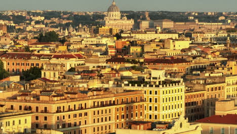 Zoomed-morning-view-of-buildings-in-city.-Tilt-up-reveal-historic-landmarks,-St.-Peters-Basilica-in-Vatican-City.-Rome,-Italy