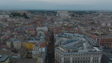 Aerial-panoramic-view-of-historic-city-centre-at-dusk.-Large-national-Victor-Emmanuel-II-Monument-in-background.-Rome,-Italy