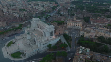 Aerial-view-of-monumental-Altar-of-the-Fatherland,-Campidoglio-and-surrounding-historic-tourist-sights.-Rome,-Italy