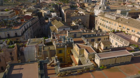 High-angle-view-of-buildings-in-urban-borough.-Tilt-up-revel-of-landmarks-in-historic-city-centre.-Rome,-Italy