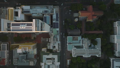 Aerial-birds-eye-overhead-top-down-shot-of-buildings-arranged-into-blocks-separated-by-street-grid.-Fly-over-urban-neighbourhood.-Cape-Town,-South-Africa