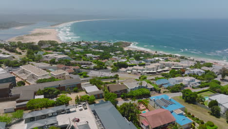 Forwards-reveal-of-luxury-residences-in-urban-borough-at-sea-coast.-Summer-vacation.-Plettenberg-Bay,-South-Africa