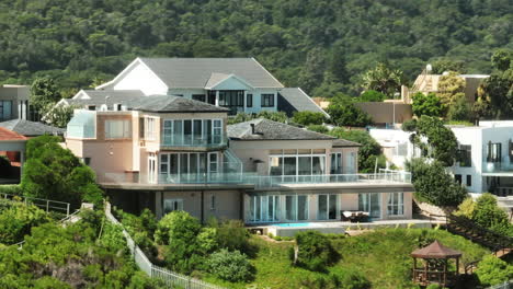 Zoomed-footage-of-luxurious-residences-in-urban-borough.-Buildings-surrounded-with-green-vegetation.-South-Africa