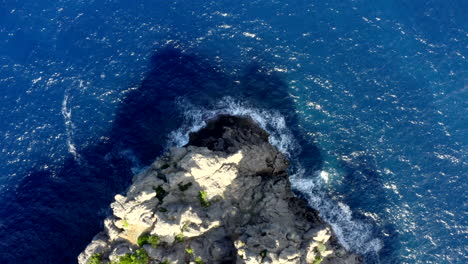 AERIAL:-Birds-View-of-Cliff-on-Tropical-Island-Mallorca,-Spain-with-ocean-and-Blue-water-in-Summer,Daylight-Vacation,-Travel,-Sunny,-Waves