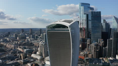 Aerial-view-of-new-modern-tall-office-buildings-in-City-district.-Sky-garden-on-top-of-The-Walkie-Talkie-skyscraper.-London,-UK