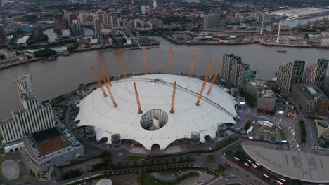 Slide-and-pan-aerial-footage-of-Millennium-Dome.-Futuristic-entertaining-facility-on-south-bank-of-River-Thames.--London,-UK