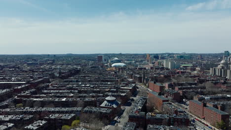 Fly-above-large-city.-Rows-of-brick-apartment-houses-in-old-housing-estate.-Aerial-panoramic-footage.-Boston,-USA