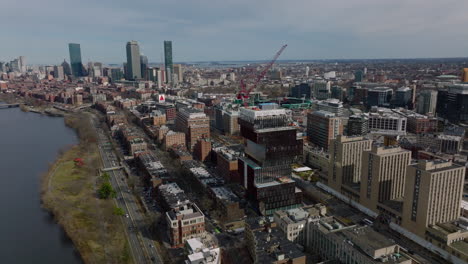 Aerial-footage-of-construction-site-of-futuristic-Faculty-of-Computing-and-Data-Sciences-building.-Cityscape-in-background.-Boston,-USA