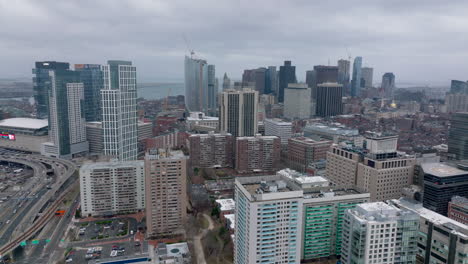 Various-multistorey-buildings-in-city.-Aerial-descending-shot-of-residential-or-office-development.-Boston,-USA