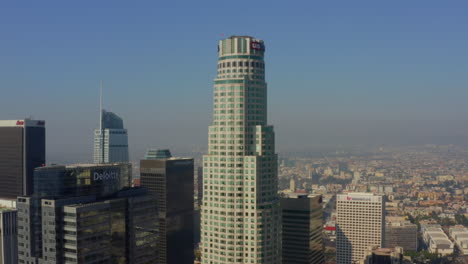 Dolly-towards-US-Bank-famous-Skyscraper-Tower-in-Downtown-Los-Angeles-Skyline-View,-Aerial-drone-perspective-wide-shot,-circa-2018