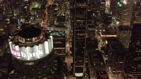 Incredible-Wide-Angle-Aerial-Shot-of-Los-Angeles,-California-Skyscrapers-at-Night-in-beautiful-City-Skyline-with-Tower-Rooftops,-Drone-Dolly-right,-Circa-2019