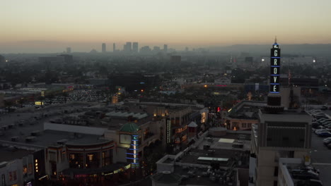 AERIAL:-Over-Shopping-Mall-the-Grove-Christmas-Vibe-Los-Angeles,-California,-Sunset