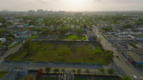 Aerial-shot-of-residential-neighbourhood-with-lot-of-trees-and-greenery.-Golden-hour-in-city.-Miami,-USA