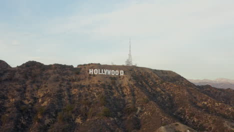 AERIAL:-Wide-Shot-of-Hollywood-Sign-Letters-at-Sunset,-Los-Angeles,-California