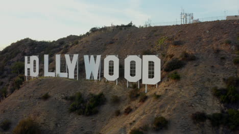 AERIAL:-Close-Up-of-Hollywood-Sign-Letters-at-Sunset,-Los-Angeles,-California
