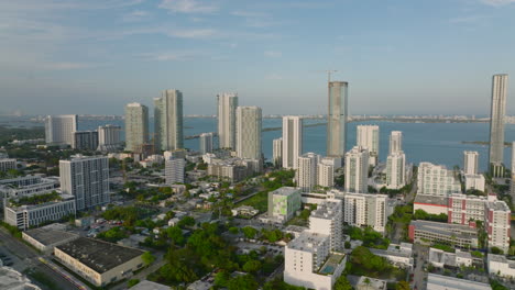 Aerial-view-of-modern-residential-city-borough-with-tall-apartment-buildings.-Golden-hour-in-town.-Miami,-USA
